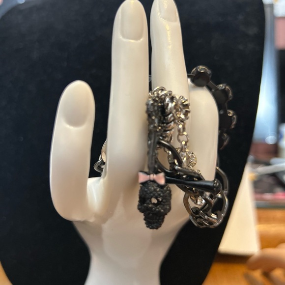 Betsey Johnson Chain/Charm bracelet
Silvertone/black/rhinestones 
Skull Key logo - Picture 8 of 11